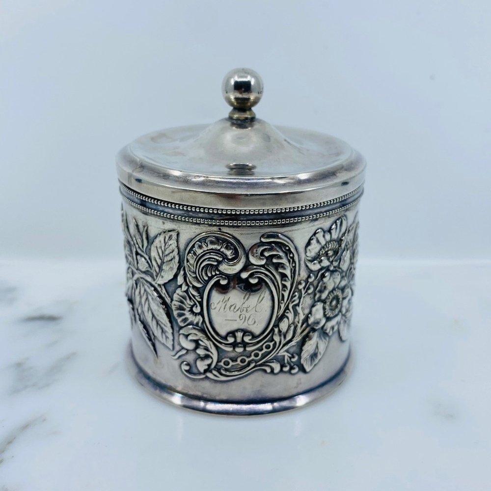 Antique stamped/hallmarked monogramed repousse silver soldered lidded container.
